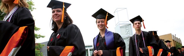 commencement students walk through the quad during the commencement festivities