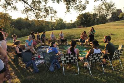 Students in lawn chairs at the Bellarmine Farm