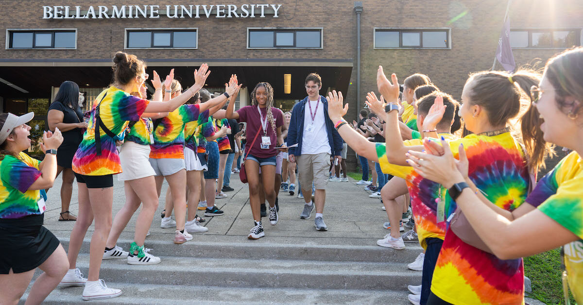 a large group of students outside of Knights Hall