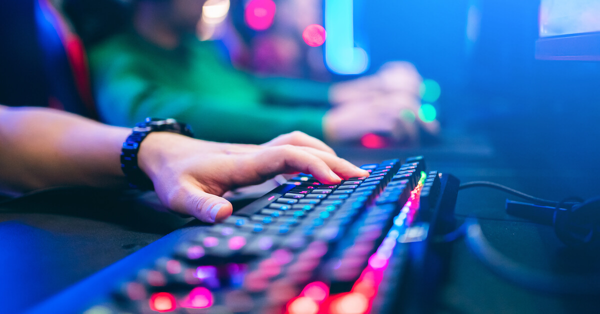 A person typing on a keyboard