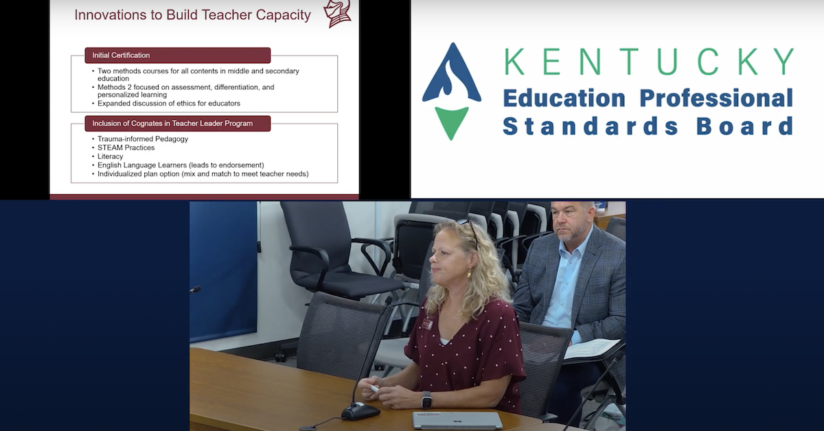 Dr. Dinkins sitting behind a desk