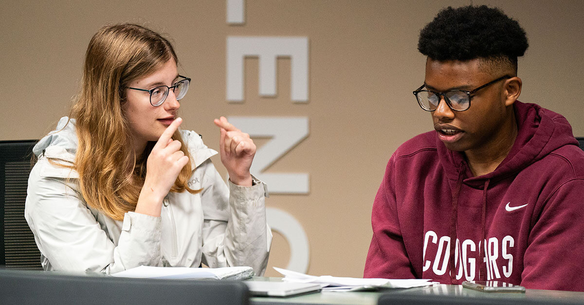 Two students in a classroom