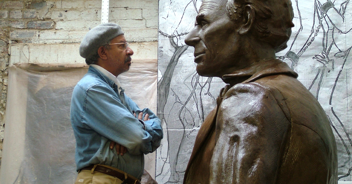 An artist and statue