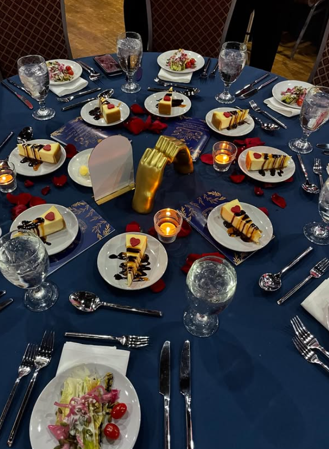 table with elegant table settings for an event for Sacred Heart