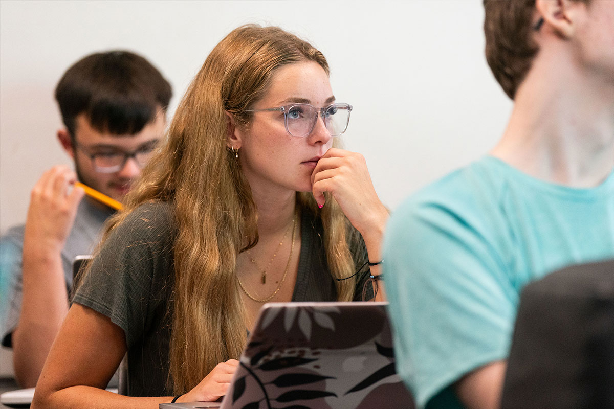 student listens in class