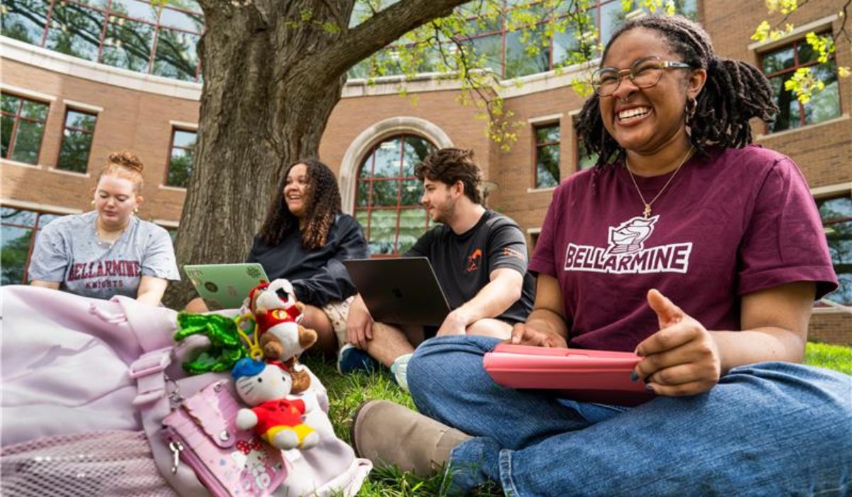 student smiling on campus