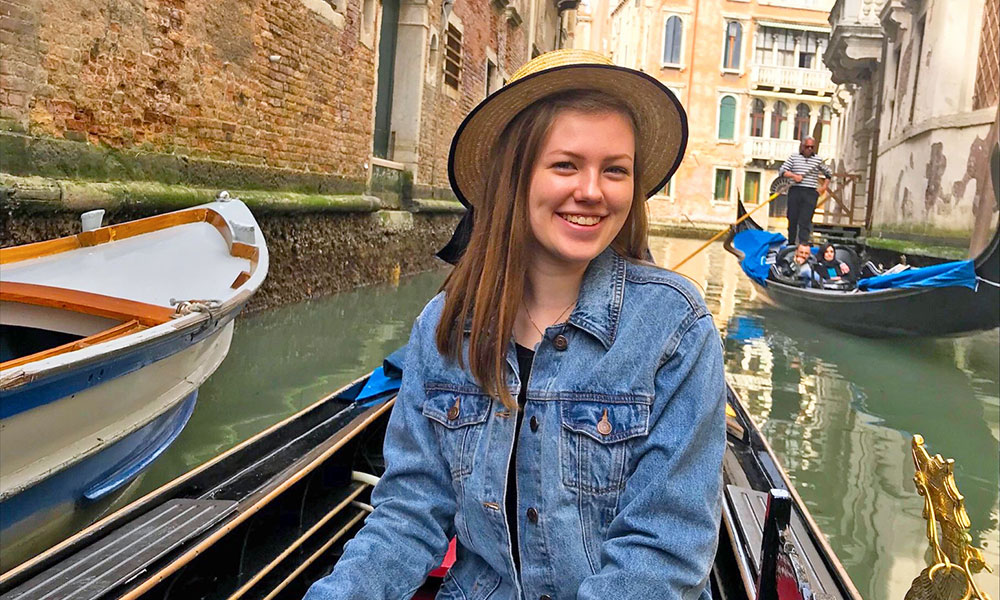 Study Abroad Lizzie Student enjoys a study abroad experience in a gondola